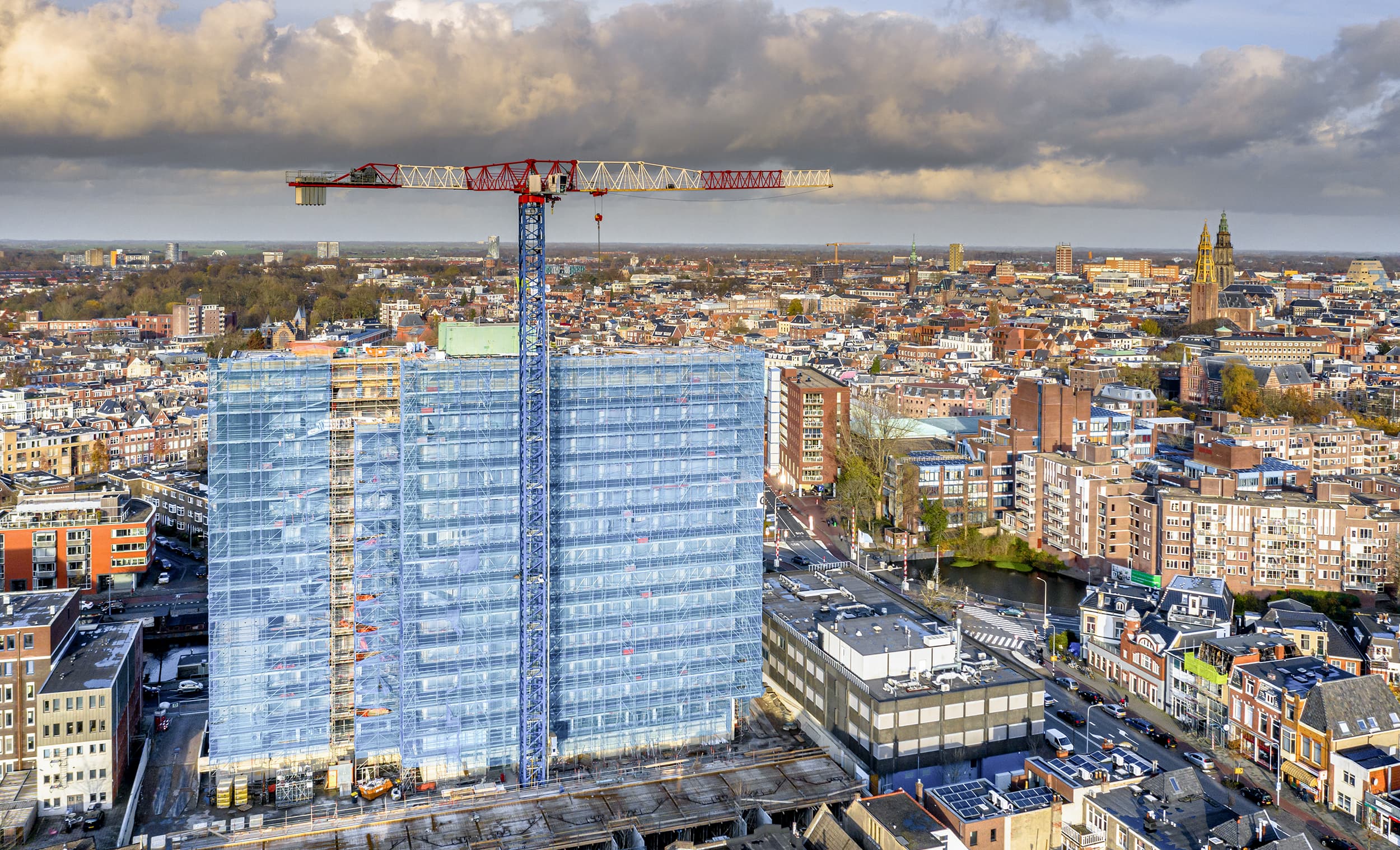 Construction crane building high rise apartment